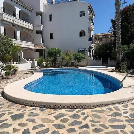 With Outdoor Pool And Air Conditioning In Apartment